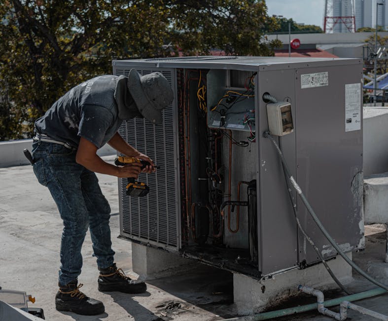 AC tune up professional HVAC technician inspection central air conditioning unit - how often should you schedule an ac tune